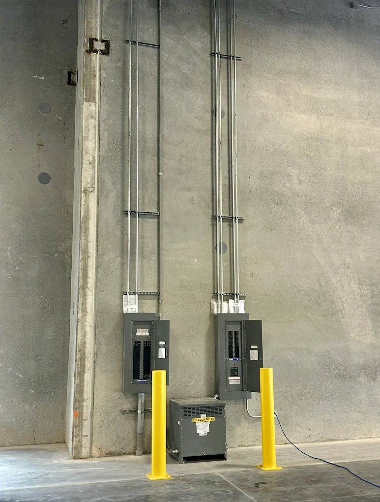 Commercial panelboards and transformer installed by Carter Electric