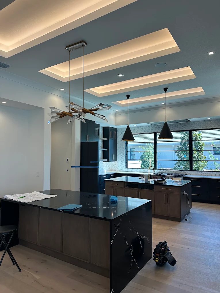 Kitchen cove lighting and pendant installation in a Southwest Florida home