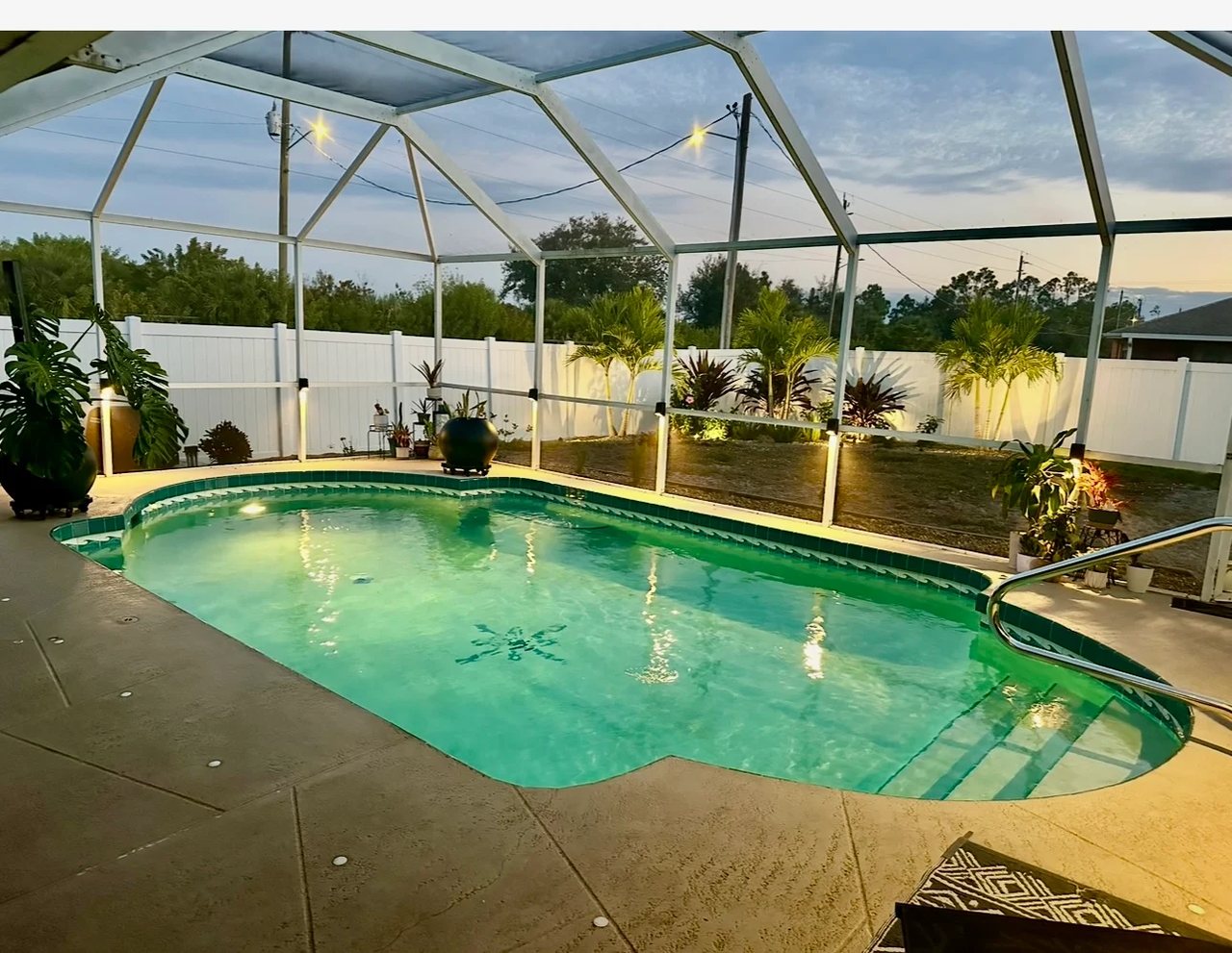 Landscape and pool cage lighting on a Southwest Florida screened lanai